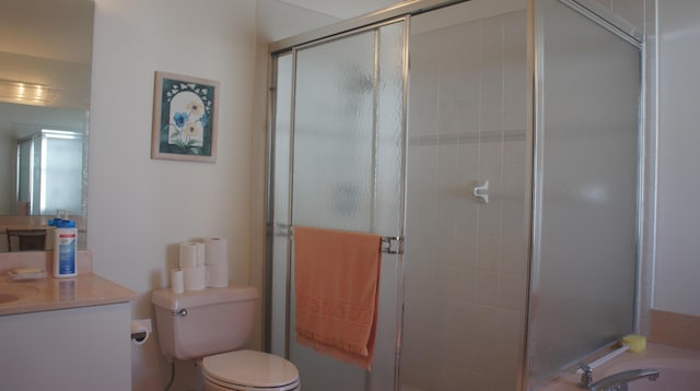 full bathroom featuring vanity, toilet, and shower with separate bathtub