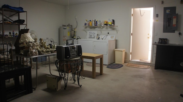 laundry area with independent washer and dryer, electric panel, and water heater