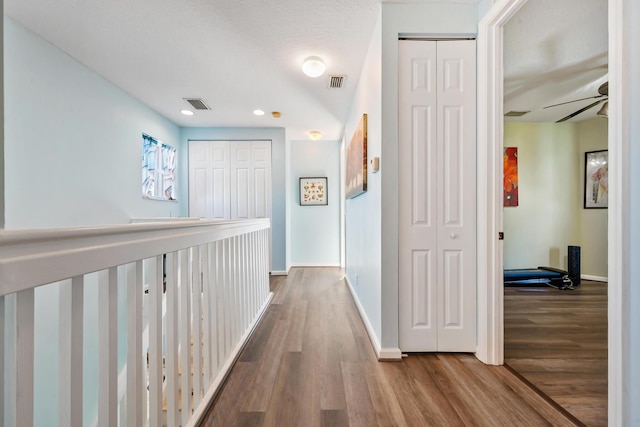 hall featuring hardwood / wood-style flooring