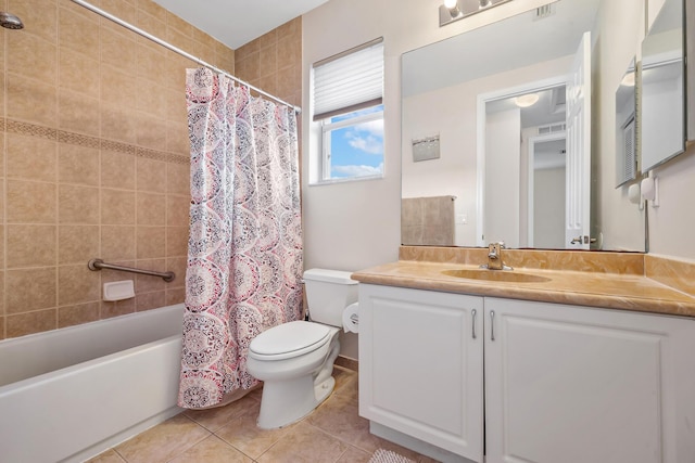 full bathroom with tile patterned flooring, vanity, toilet, and shower / tub combo