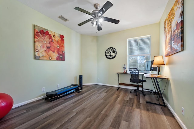 office area with dark hardwood / wood-style flooring and ceiling fan