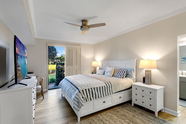 bedroom featuring hardwood / wood-style floors, access to outside, sink, crown molding, and ceiling fan