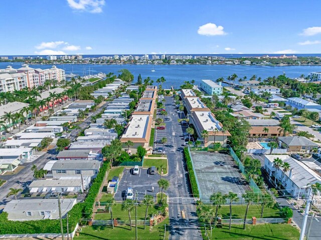 drone / aerial view with a water view