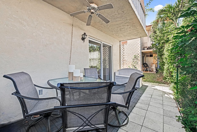 view of patio featuring ceiling fan