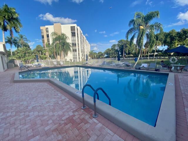 view of swimming pool featuring a patio