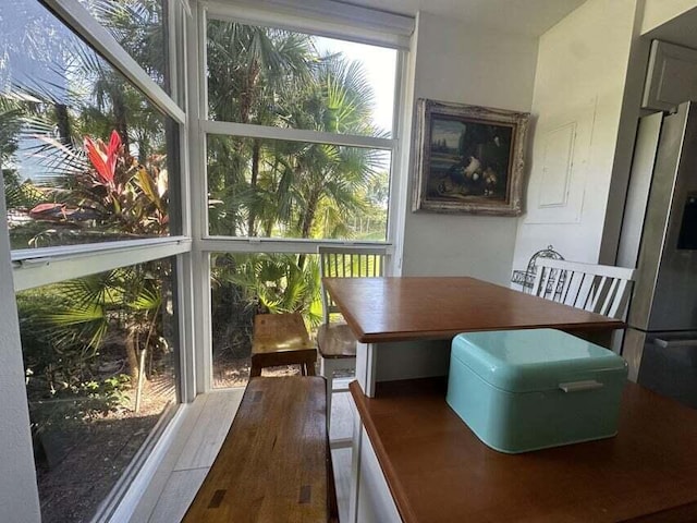 sunroom with plenty of natural light