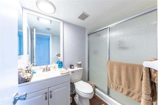 full bath featuring a shower stall, visible vents, and vanity