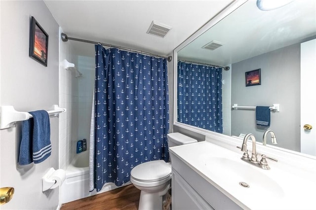 full bath featuring toilet, shower / tub combo, visible vents, and wood finished floors