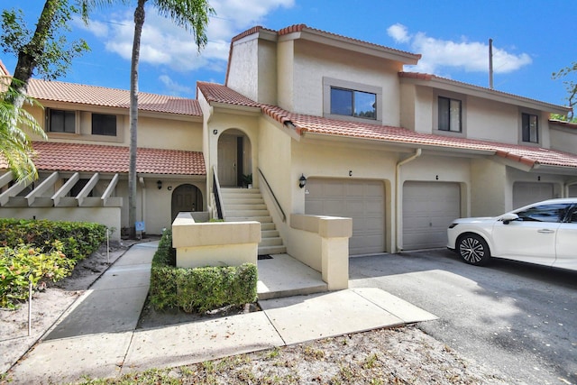 view of front of property with a garage