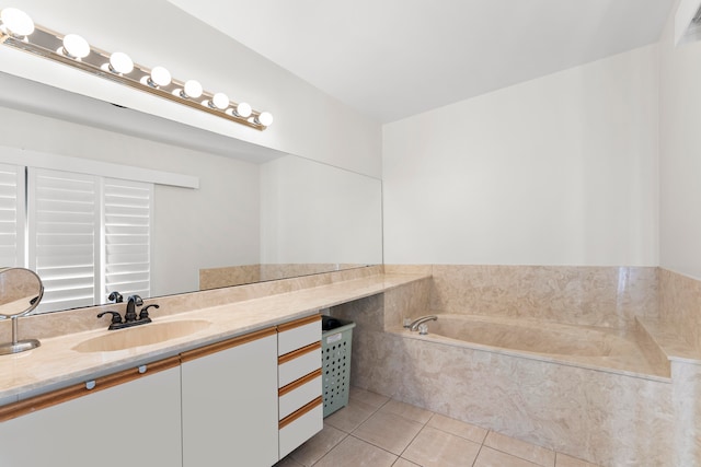 bathroom featuring tile patterned flooring, vanity, and walk in shower