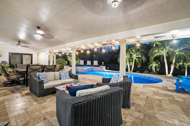 view of pool with an outdoor hangout area, a patio, and a lawn