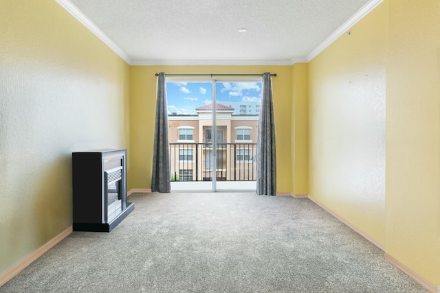 unfurnished living room with ornamental molding, carpet floors, and a textured ceiling