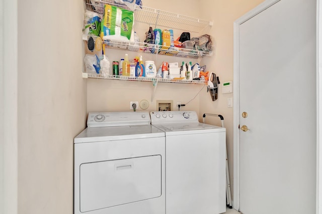 laundry area with washer and dryer