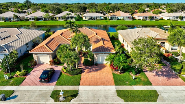 aerial view featuring a water view