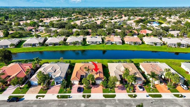 bird's eye view with a water view