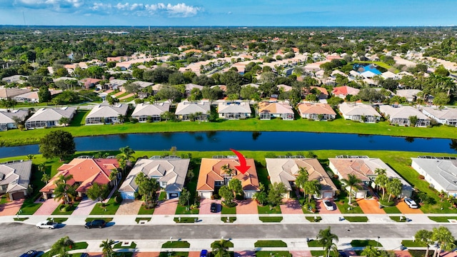 drone / aerial view featuring a water view