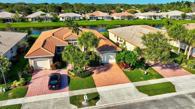 bird's eye view with a water view