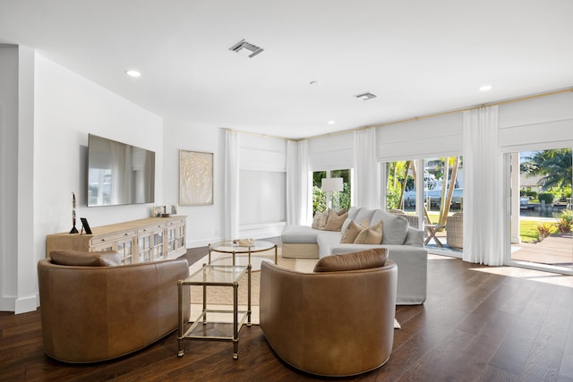 living room with dark wood-type flooring