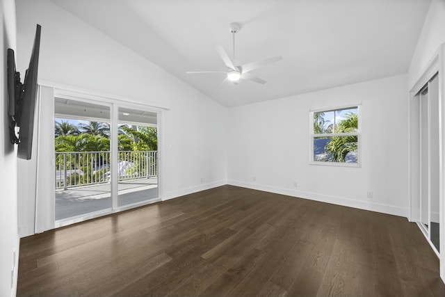 unfurnished bedroom with dark hardwood / wood-style floors, ceiling fan, access to exterior, and vaulted ceiling