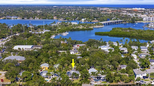 birds eye view of property featuring a water view