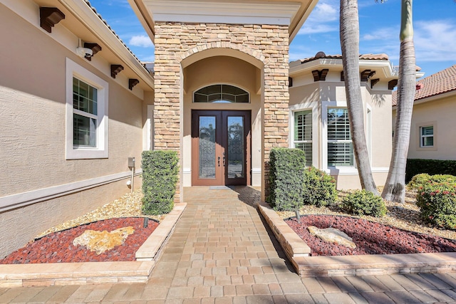 view of exterior entry with french doors