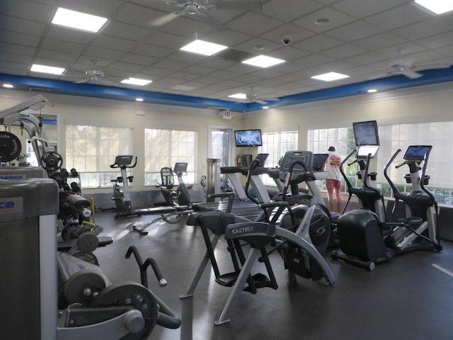 exercise room with a paneled ceiling