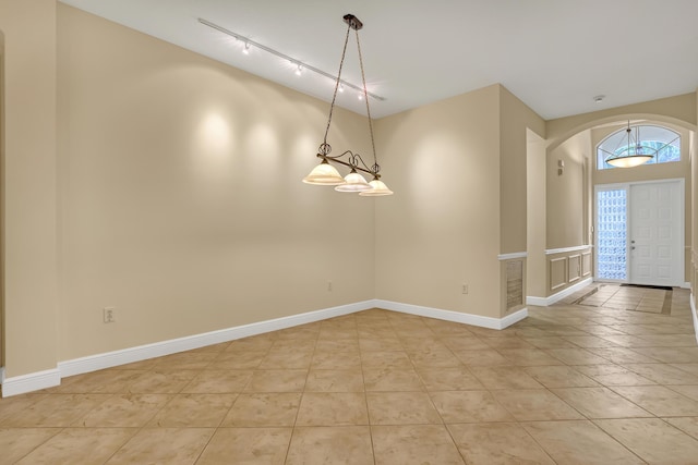 interior space featuring light tile patterned floors