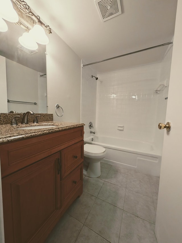 empty room with light tile patterned flooring and a textured ceiling