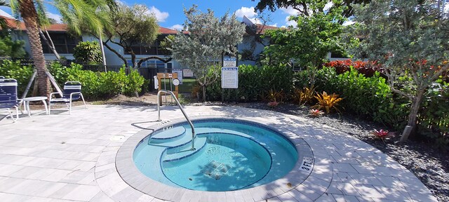 view of pool featuring a patio area