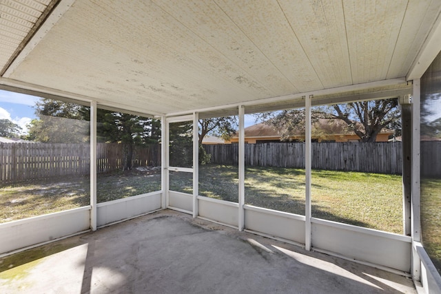 unfurnished sunroom featuring a wealth of natural light