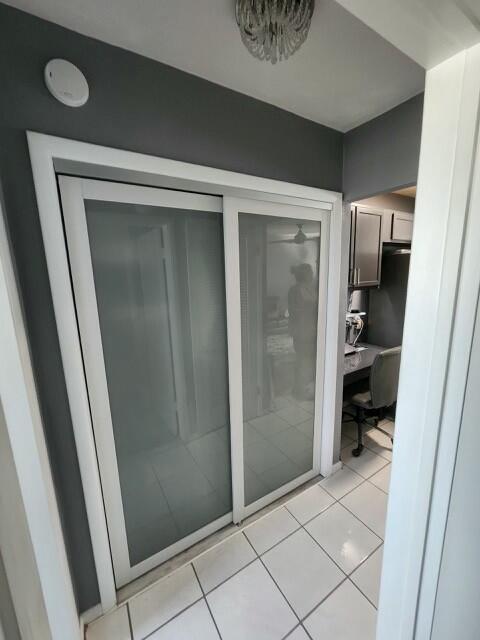 bathroom with tile patterned flooring