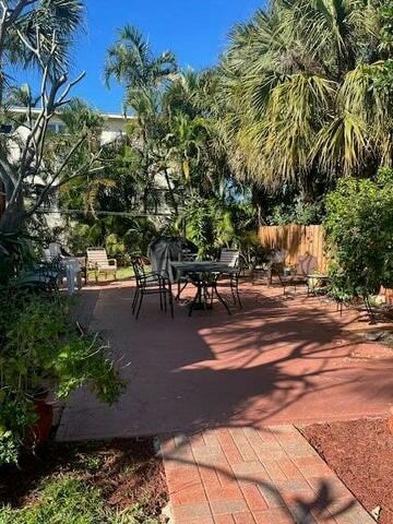 view of patio / terrace with fence and outdoor dining space