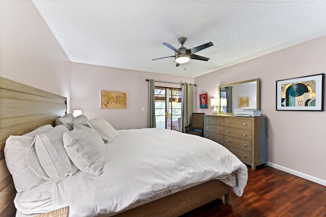 bedroom featuring ceiling fan, dark hardwood / wood-style flooring, and a textured ceiling