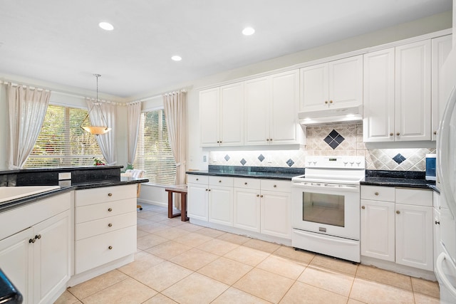 kitchen with white cabinetry, light tile patterned flooring, white electric range oven, and decorative light fixtures