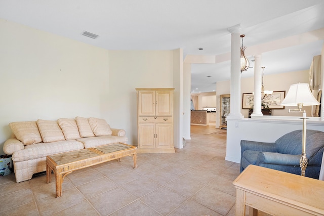 tiled living room with decorative columns