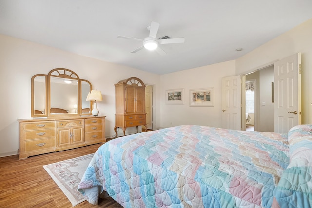 bedroom featuring light hardwood / wood-style floors and ceiling fan