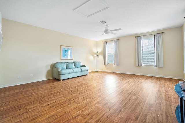 unfurnished room with ceiling fan and light hardwood / wood-style flooring