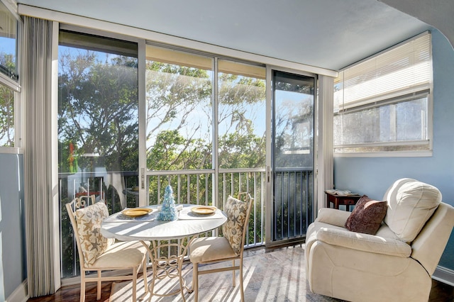 sunroom / solarium featuring plenty of natural light