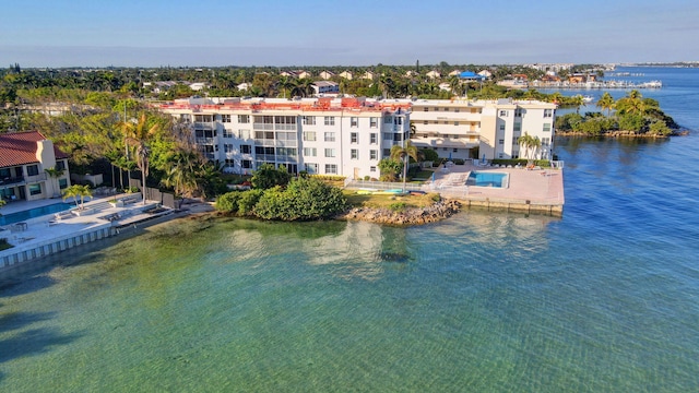 birds eye view of property featuring a water view