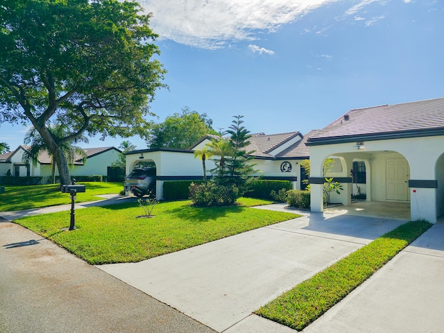 view of front of home with a front lawn