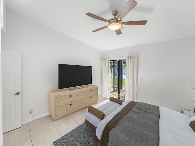 bedroom with access to exterior, ceiling fan, light tile patterned floors, and lofted ceiling