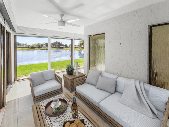 sunroom / solarium featuring a water view, ceiling fan, and a healthy amount of sunlight