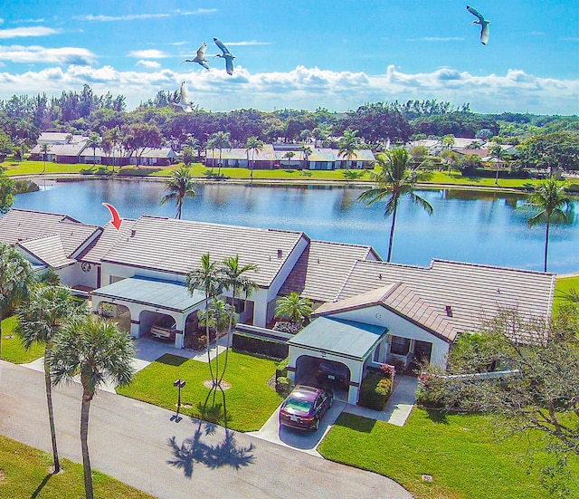 bird's eye view with a water view