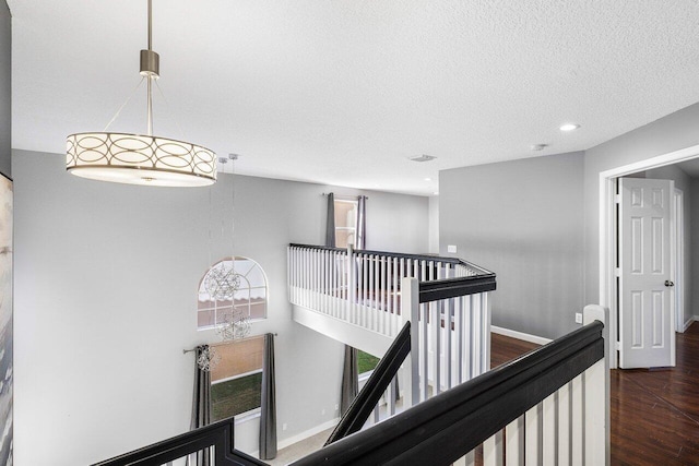 hallway with dark hardwood / wood-style floors