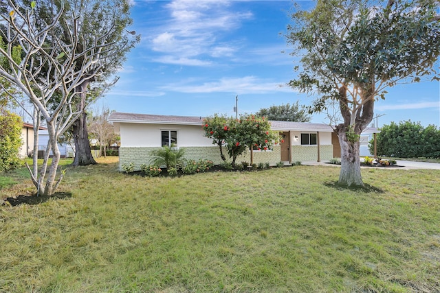 exterior space featuring a front lawn