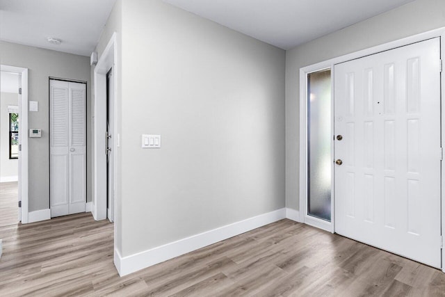 entryway with light wood-type flooring