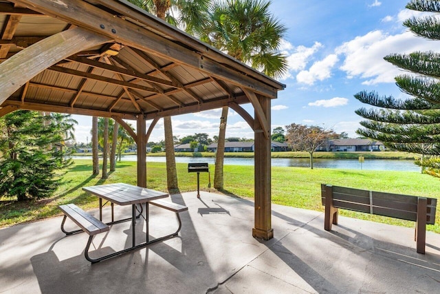 view of patio / terrace featuring a gazebo and a water view