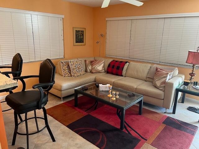 living room with ceiling fan