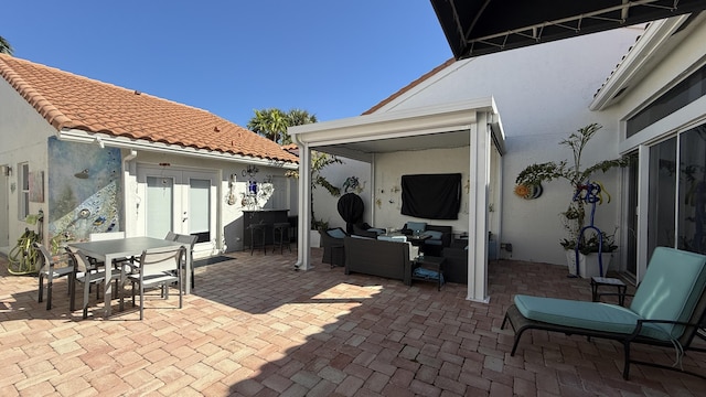 view of patio / terrace featuring outdoor lounge area and french doors