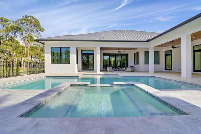 view of pool featuring an in ground hot tub, ceiling fan, and a patio